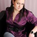 Introducing Rozanna: Your Friendly and Open-Minded Masseuse!